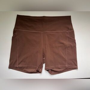 Lululemon size 14 6 inch bike shorts brown with pockets